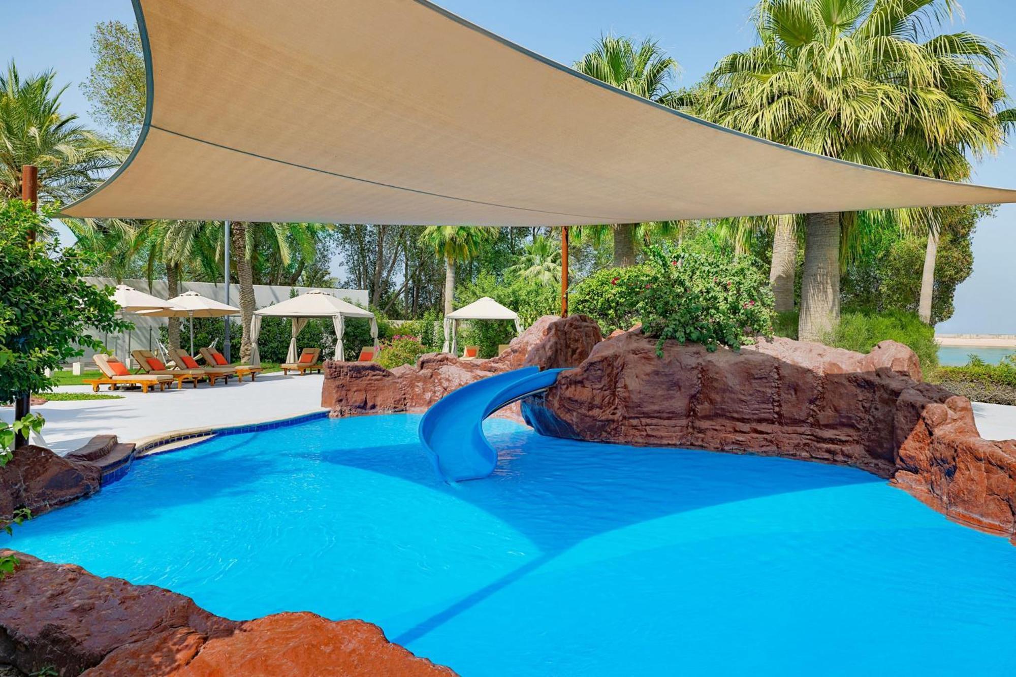The Ritz-Carlton, Doha Hotel Екстериор снимка Shade sail over a pool